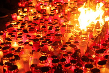 Candles in red and white color in the night. November 11th, Latvia celebrate Lacplesa day