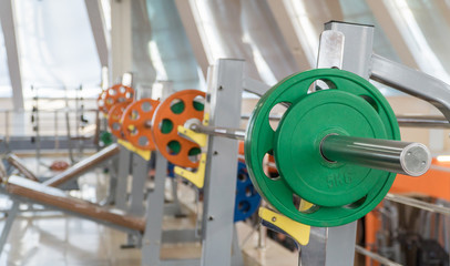 sports equipment and barbells in the gym