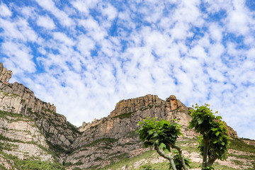 Fototapeta premium view from the cable cars climbing to the top of Santa Maria de Montserrat abbey in Monistrol, Catalonia, Spain
