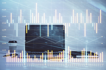 Forex graph hologram with desktop office computer background. Double exposure. Concept of financial...