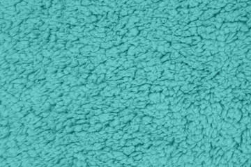 Fototapeta na wymiar Teal sherpa textured plush fabric material background