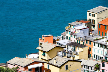 Fototapeta na wymiar coastal view of Cinque Terre, the Riomaggiore village which is a small village in the Liguria region of Italy.