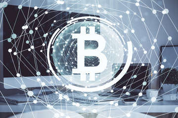 Multi exposure of blockchain theme hologram and table with computer background. Concept of bitcoin...