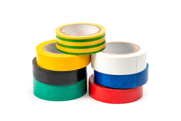 Rolls of insulation adhesive tape, multi colored ribbons on a white background. Bright and colorful insulation tape