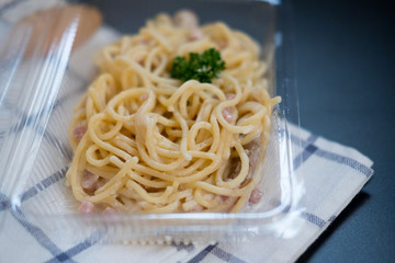 Spaghetti carbonara with bacon and ham