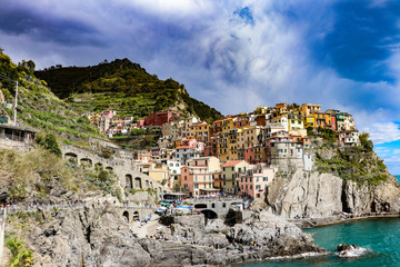 Fototapeta na wymiar Exploring the coastal village of Manarola, which is a small village in the Liguria region of Italy known as Cinque Terra