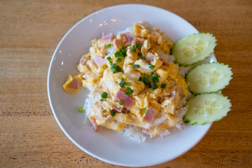 Omelet with bacon on rice