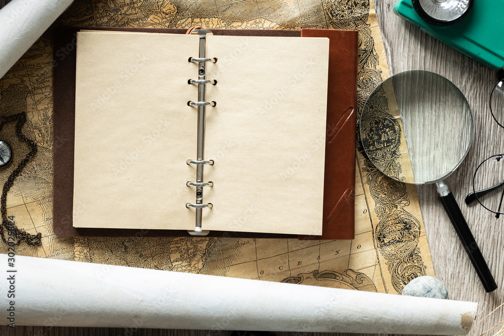 Aufkleber Journey.  Notebook with space for text.  Souvenirs and things related to travel and exploring the world.