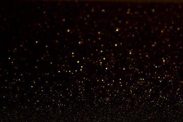  Christmas Background. Happy New Year.Christmas golden light shine particles bokeh on black...