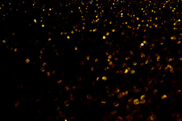  Christmas Background. Happy New Year.Christmas golden light shine particles bokeh on black background, holiday. Concept