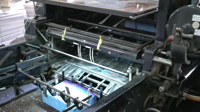 old printing machine working in industrial