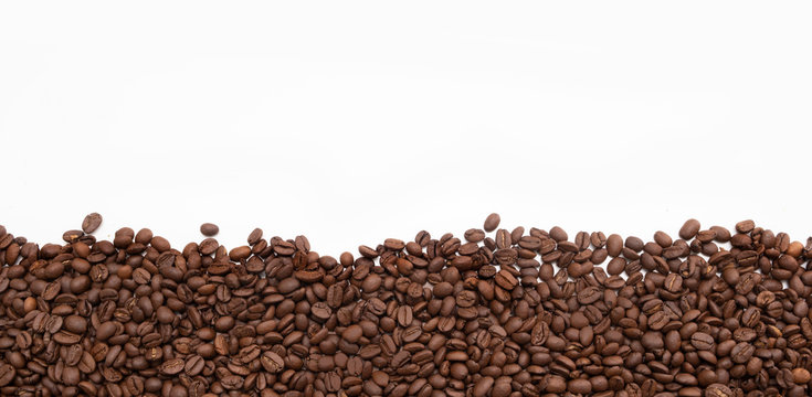 Coffee beans border against white background