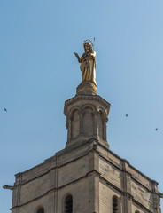 Closeup of statue of Virgin Mary at Notre-Dame des Doms cathedral in Avignon