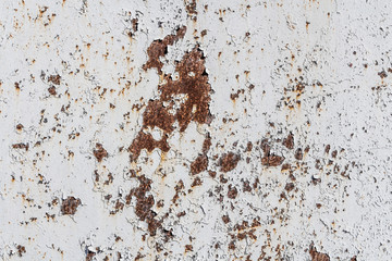 Beautiful horizontal texture of white metal sheet with orange rust and holes is in the photo