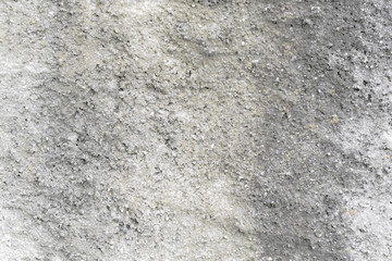 close up of rough gray concrete wall background 