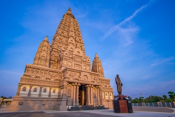 Mahabodhi Temple or Bodh Gaya Pagoda at Wat-Panyanantaram  sunrise and beautiful sky, Wat Panyanantaram is famous pagoda and popular for traveler near bangkok at Pathum Thani, Thailand