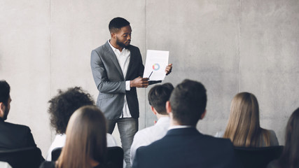 Financial manager making presentation, showing diagram, free space