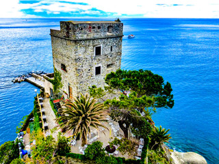 exploring Torre Aurora, Down Tower, at  the costal village of Riomaggiore which is a small village in the Liguria region of Italy known as Cinque Terra