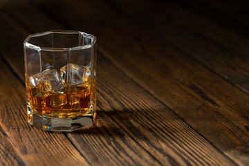 Whiskey in glass with ice