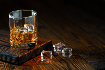 Whiskey in glass with ice