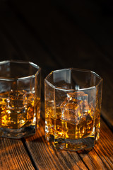 Whiskey in glass with ice