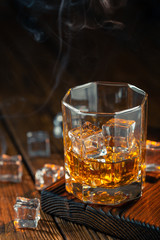 Whiskey in glass with ice