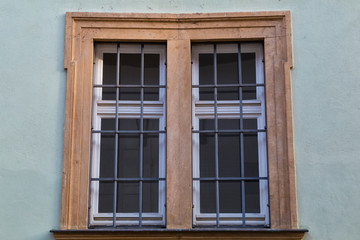 Fototapeta na wymiar Antique multi-colored barred window