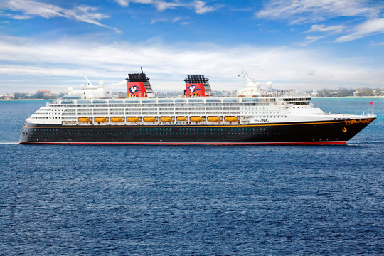 GEORGE TOWN, GRAND CAYMAN ISLAND - FEBRUARY 26, 2013: Disney Cruise Line, cruise ship Disney Magic Sails from Port George Town. Disney Magic is one of the most admired and recognizable ocean liners 