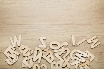 Wooden letters on brown table