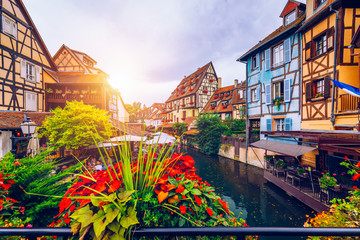 Colmar, Alsace, France. Petite Venice, water canal and traditional half timbered houses. Colmar is a charming town in Alsace, France. Beautiful view of colorful romantic city Colmar, France, Alsace. - obrazy, fototapety, plakaty
