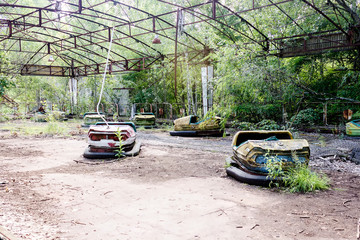 broken children's cars. Abandoned children's park. Unhappy childhood.