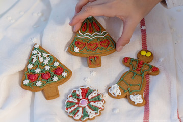 ginger Christmas cookies decorated by children with sugar pencils