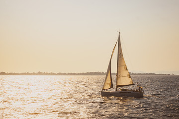 Fototapeta premium Yacht in the sea at sunset in Mediterranean sea, Turkey