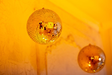 Disco ball for party for new year, golden mood color glow, flicker. Christmas day concept