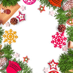 New Year's still life of toys and needles on a white background.