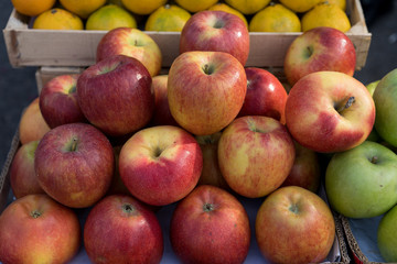 Apples on the counter for sale