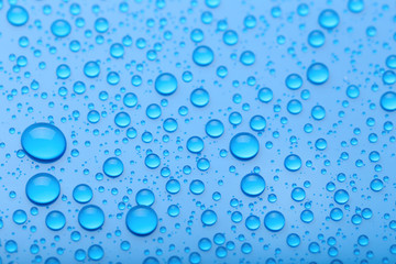 Water drops on blue background