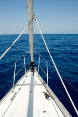 sailboat rolled genova sailing with sea bottom
