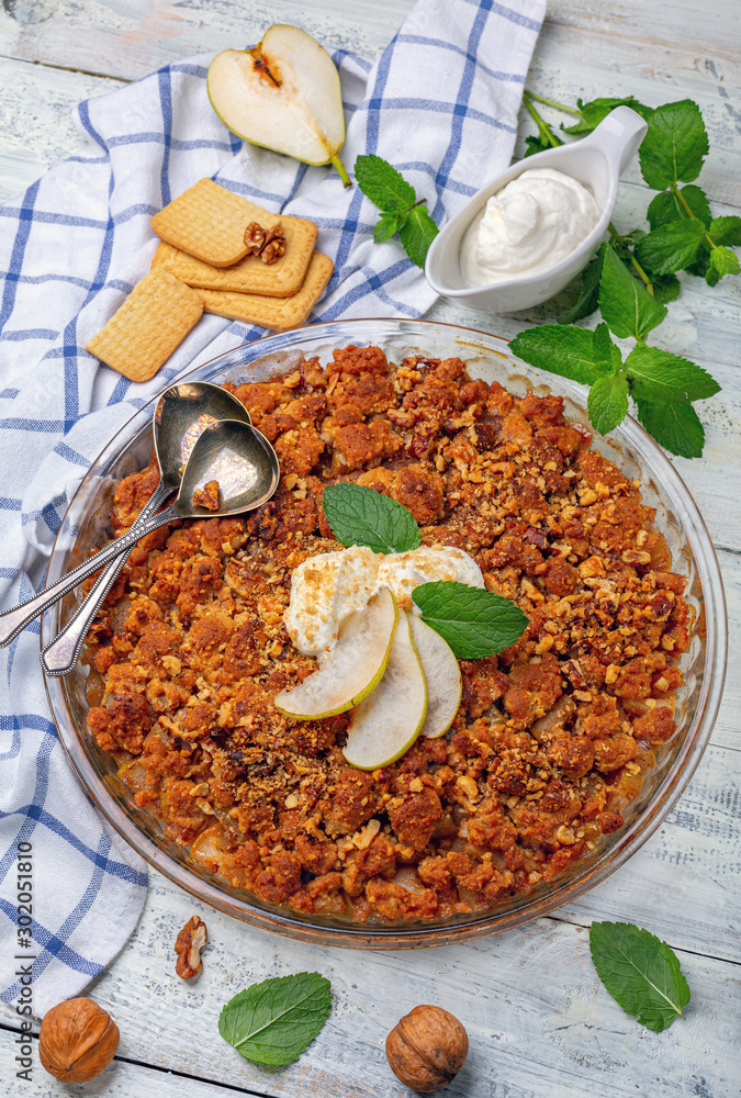 Wall mural pear crumble with a sprig of mint.