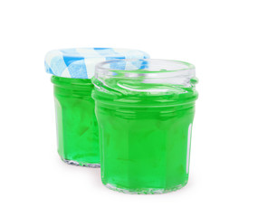 Jam in a glass jar on a white background