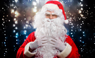 Santa Claus portrait in a glittery winter background setting