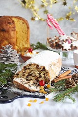 Stollen. Traditional German Christmas cake Stollen on wooden background.