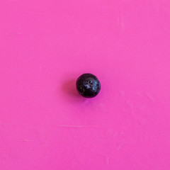 Approach to fruit with colored background