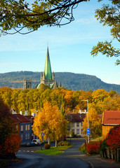 Golden autumn in Trondheim. View of the old town and the Nidarosdomen cathedral.