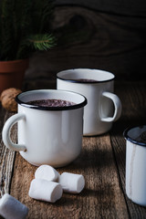 Hot chocolate, cocoa  on the festive rustic wooden table