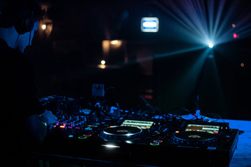 Fototapeta na wymiar Illuminated platines in a Nightclub