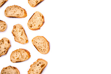 Frame of pieces of white bread isolated on white background. Flat lay, top view. Copy space for your text.