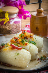 Potato dumplings stuffed with minced meat.