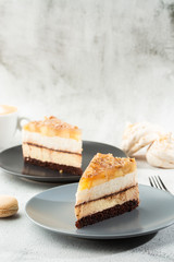 pear chocolate cake on gray plate on marble background. Selective focus. Vertical photo. Menu for bakery. cafe menu. Pastry. Delicious and sweet dessert at cafe restaurant.
