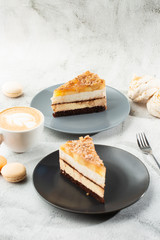 pear chocolate cake on gray plate on marble background. Selective focus. Vertical photo. Menu for bakery. cafe menu. Pastry. Delicious and sweet dessert at cafe restaurant.